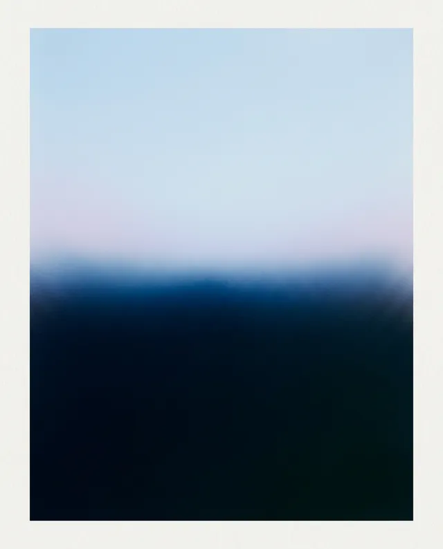 A serene abstract illustration featuring softly blended hues of blue and pale pink, evoking a tranquil mood. The gradient transitions create a dreamlike atmosphere, emphasizing simplicity and subtlety.