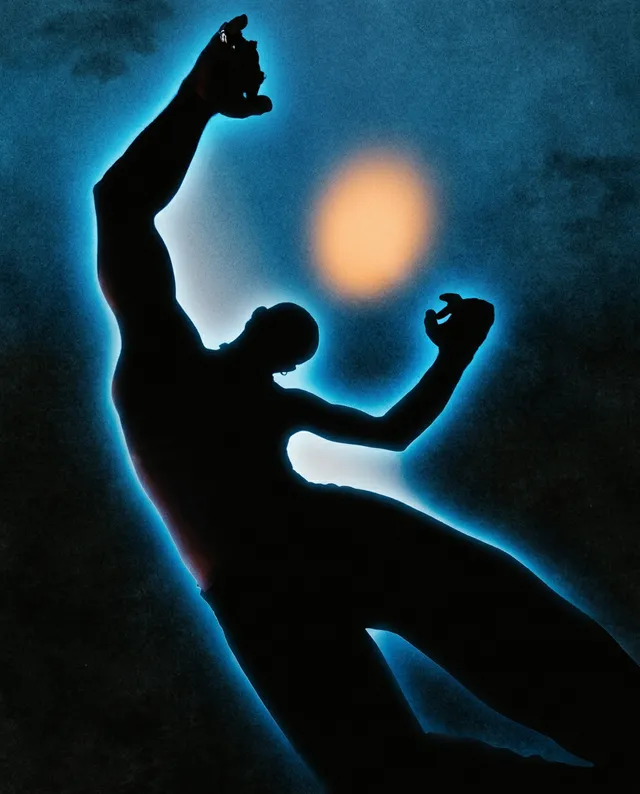 A dramatic silhouette of a figure reaching upward against a moody, dark background, featuring a glowing halo effect. The image employs a high-contrast style with deep blues and hints of orange, creating an intense and dynamic atmosphere.