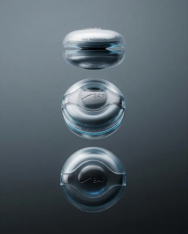 A sleek, modern product shot of Nike's innovative design, featuring three transparent capsules arranged vertically. The image conveys a futuristic mood with a cool color palette dominated by shades of blue and gray, complemented by reflective surfaces.