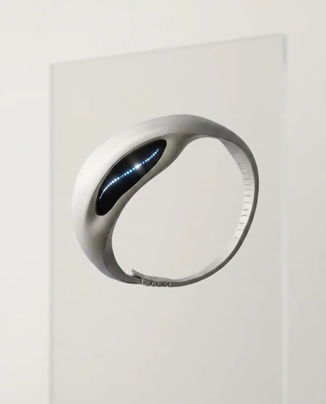 A sleek, futuristic smartwatch hovers against a minimalist background, showcasing an innovative design with a glossy silver finish and subtle blue LED lights. The overall mood is modern and high-tech, emphasizing sophistication and elegance.