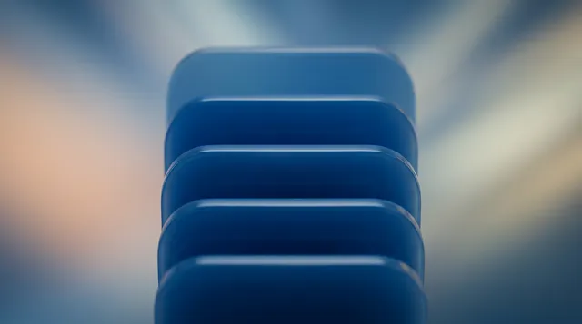 A close-up shot of stacked blue objects creates a sleek, modern aesthetic with a sense of depth and motion. The soft focus and gradient background evoke a calming yet dynamic mood.