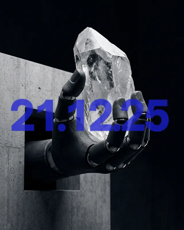 A metallic robotic hand holds a large crystal, emerging from a concrete wall.