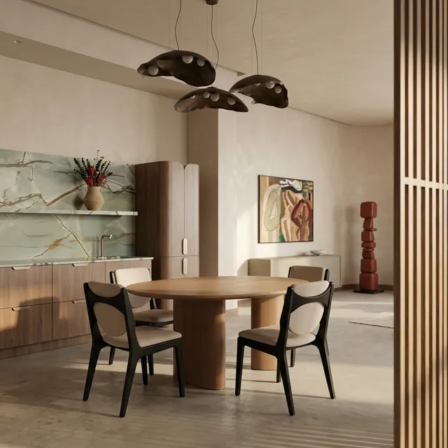 A modern interior design scene featuring a circular wooden dining table surrounded by sleek chairs, complemented by unique pendant lighting. The warm, earthy tones and minimalist style create a calm and inviting atmosphere.