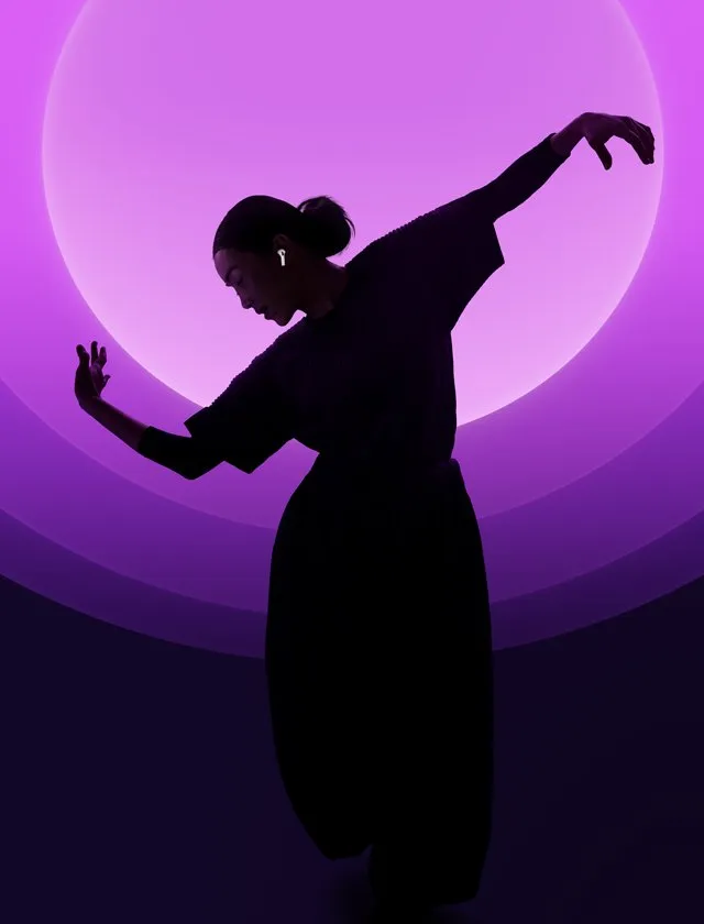 A striking silhouette of a dancer is set against a vibrant gradient of purple hues, creating a dynamic and expressive mood. The illustration captures movement and elegance, enhanced by the ethereal background light.